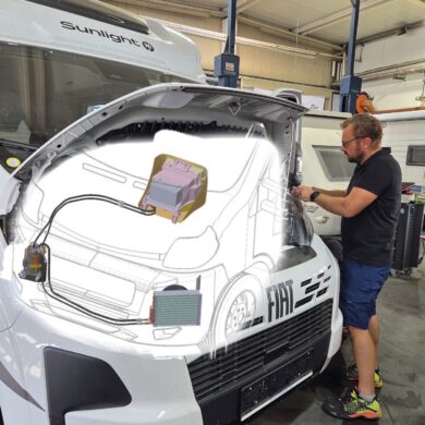 Mechanic inspecting the engine bay of a white Fiat van with a schematic diagram overlay on the hood.